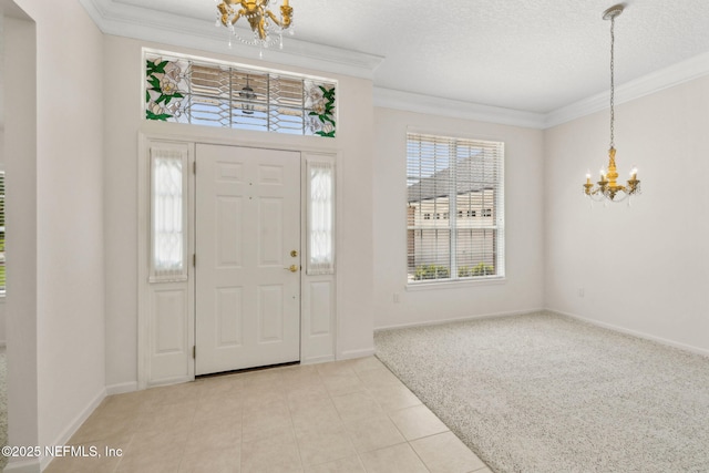 3384 Olympic Dr, Green Cove Springs, FL 32043 - foyer with a chandelier, ornamental molding, baseboards, light colored carpet, and light tile patterned floors