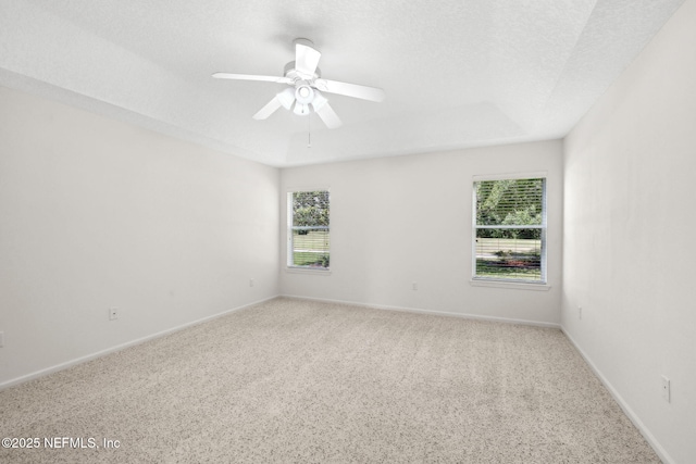 3384 Olympic Dr, Green Cove Springs, FL 32043 - carpeted empty room featuring a ceiling fan, baseboards, and a textured ceiling