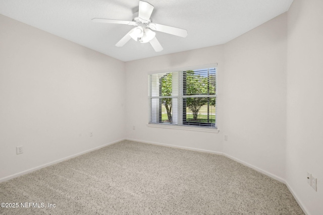 3384 Olympic Dr, Green Cove Springs, FL 32043 - carpeted empty room with baseboards and a ceiling fan