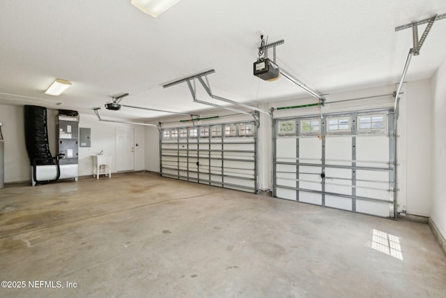 3384 Olympic Dr, Green Cove Springs, FL 32043 - garage featuring a garage door opener and electric panel