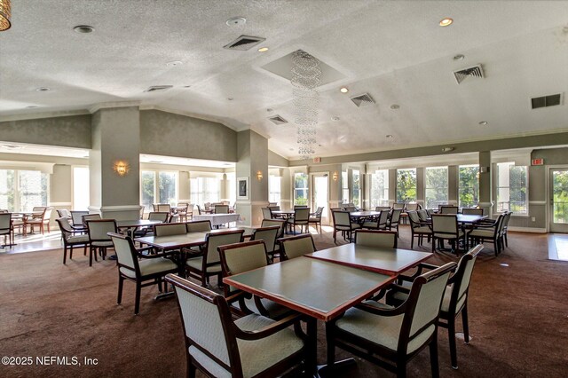3384 Olympic Dr, Green Cove Springs, FL 32043 - dining space with carpet floors, high vaulted ceiling, a textured ceiling, ornate columns, and recessed lighting