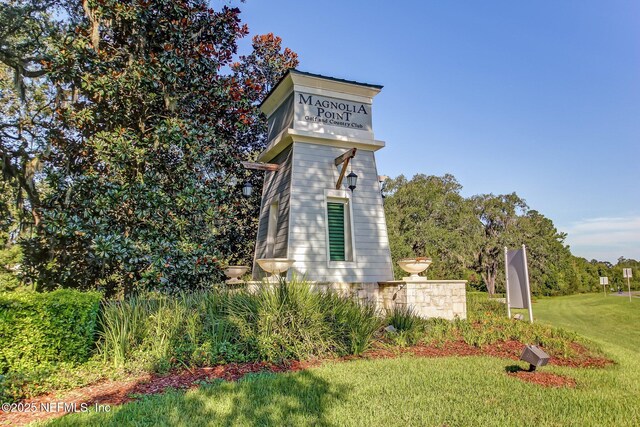 3384 Olympic Dr, Green Cove Springs, FL 32043 - view of property's community with a lawn
