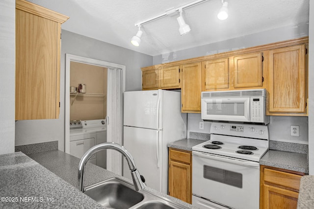 7701 Timberlin Park Blvd Unit 1535, Jacksonville, FL 32256 - kitchen with white appliances, independent washer and dryer, and a sink