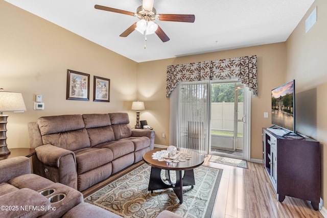2615 Golden Lake Loop, Saint Augustine, FL 32084 - living area featuring baseboards, a ceiling fan, and light wood finished floors