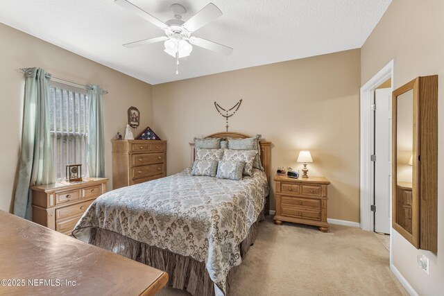 2615 Golden Lake Loop, Saint Augustine, FL 32084 - bedroom with light colored carpet, baseboards, and a ceiling fan