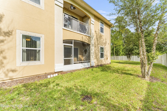 2615 Golden Lake Loop, Saint Augustine, FL 32084 - back of house featuring a balcony and stucco siding