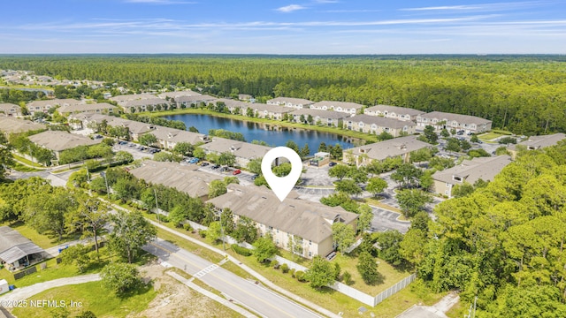 2615 Golden Lake Loop, Saint Augustine, FL 32084 - view of property location featuring a heavily wooded area, nearby suburban area, and a large body of water