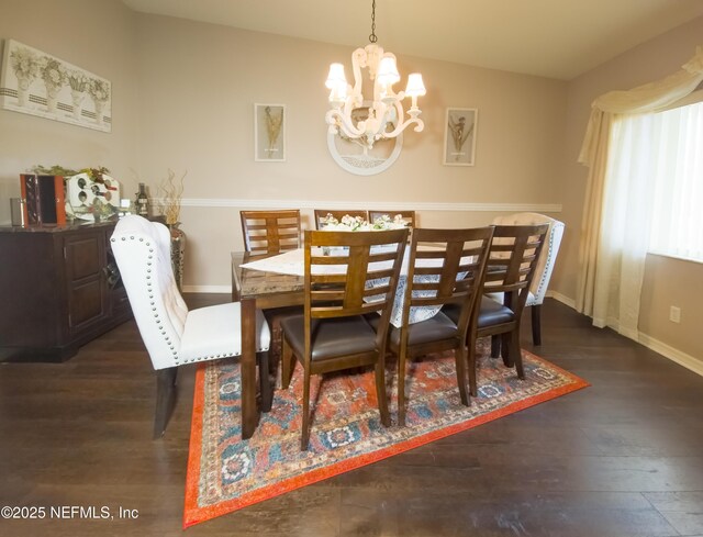 10031 SW 62nd Cir, Ocala, FL 34476 - dining space with a chandelier, wood finished floors, and baseboards