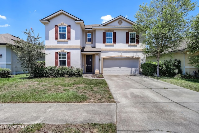 1071 Wetland Ridge Cir, Middleburg, FL 32068 - traditional-style home with stucco siding, an attached garage, concrete driveway, and a front lawn