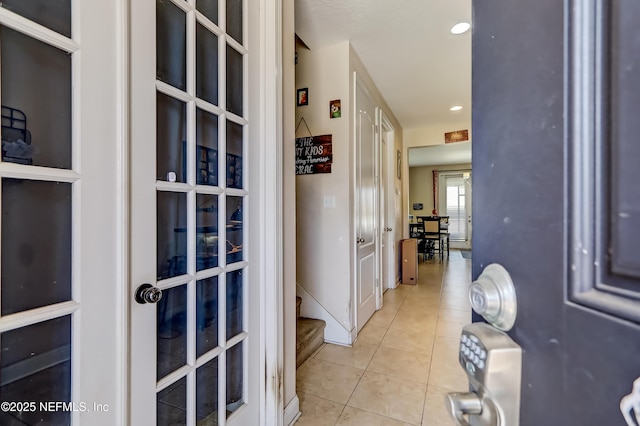 1071 Wetland Ridge Cir, Middleburg, FL 32068 - corridor featuring tile patterned flooring, stairs, and recessed lighting