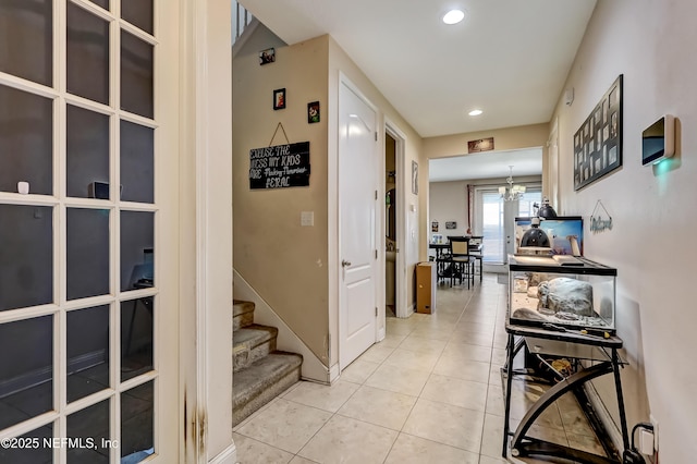 1071 Wetland Ridge Cir, Middleburg, FL 32068 - corridor with light tile patterned floors, recessed lighting, stairs, and a chandelier