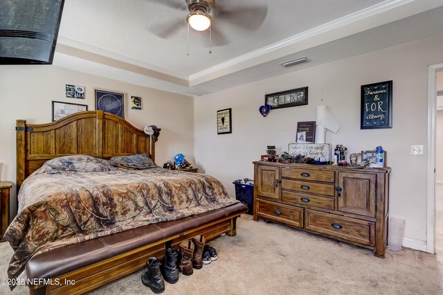 1071 Wetland Ridge Cir, Middleburg, FL 32068 - bedroom with light carpet, crown molding, ceiling fan, and a raised ceiling