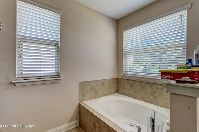 1071 Wetland Ridge Cir, Middleburg, FL 32068 - full bathroom with a bath and baseboards