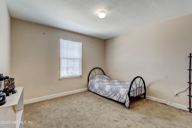 1071 Wetland Ridge Cir, Middleburg, FL 32068 - carpeted bedroom featuring baseboards and a textured ceiling