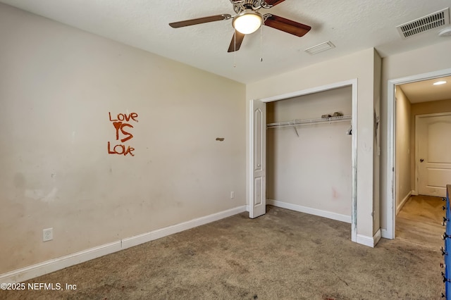 1071 Wetland Ridge Cir, Middleburg, FL 32068 - unfurnished bedroom featuring carpet flooring, a closet, baseboards, and ceiling fan