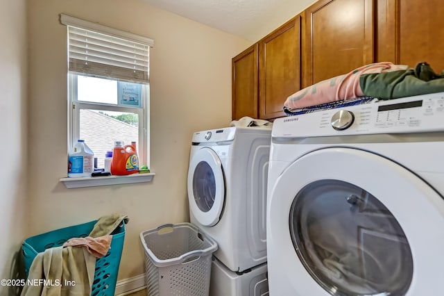 1071 Wetland Ridge Cir, Middleburg, FL 32068 - laundry room with washing machine and clothes dryer and cabinet space