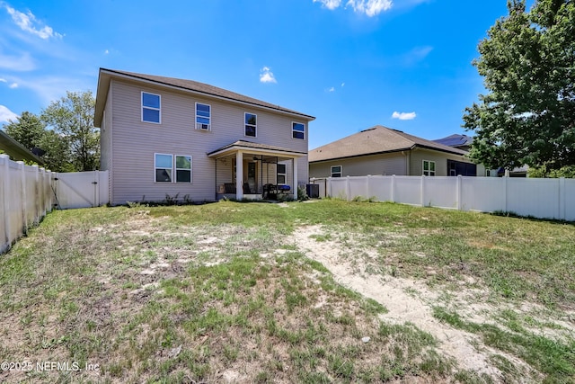 1071 Wetland Ridge Cir, Middleburg, FL 32068 - back of property featuring a gate and a ceiling fan