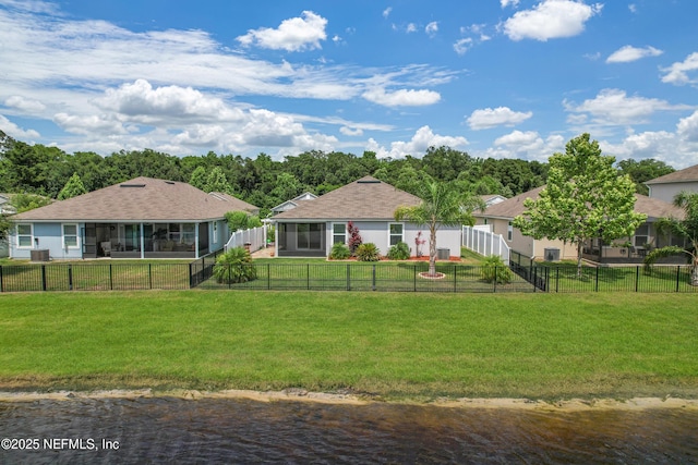 258 Fox Water Trl, Saint Augustine, FL 32086 - back of property with a sunroom and roof with shingles