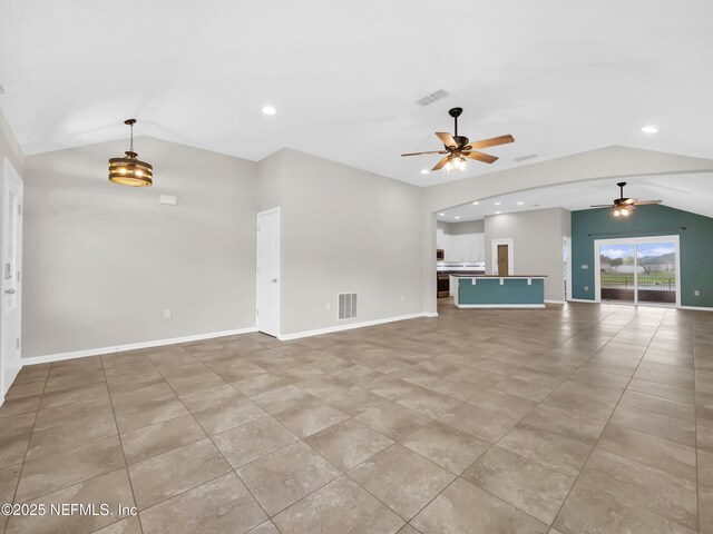 258 Fox Water Trl, Saint Augustine, FL 32086 - unfurnished living room featuring lofted ceiling, a ceiling fan, recessed lighting, light tile patterned flooring, and baseboards