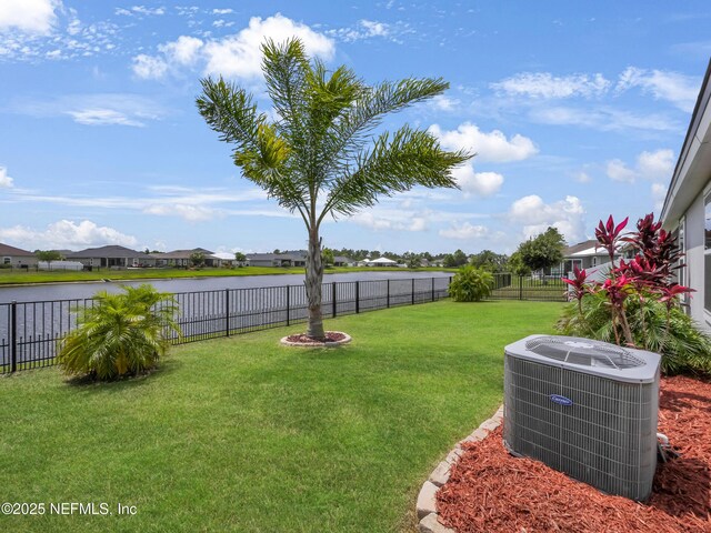 258 Fox Water Trl, Saint Augustine, FL 32086 - view of yard featuring central AC unit, a water view, and a residential view