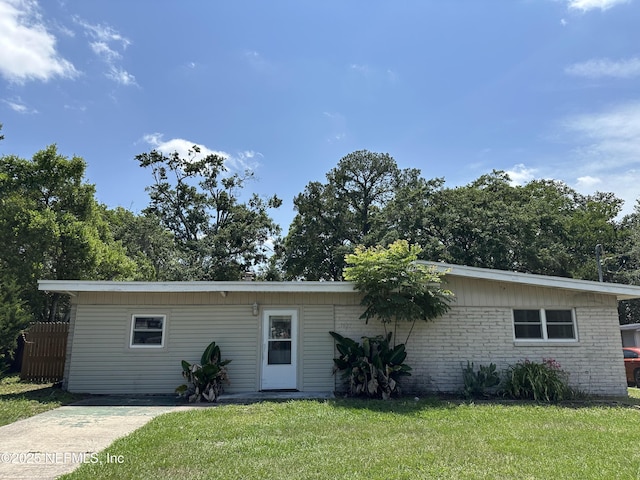 1927 Fouraker Rd, Jacksonville, FL 32210 - single story home with a front lawn