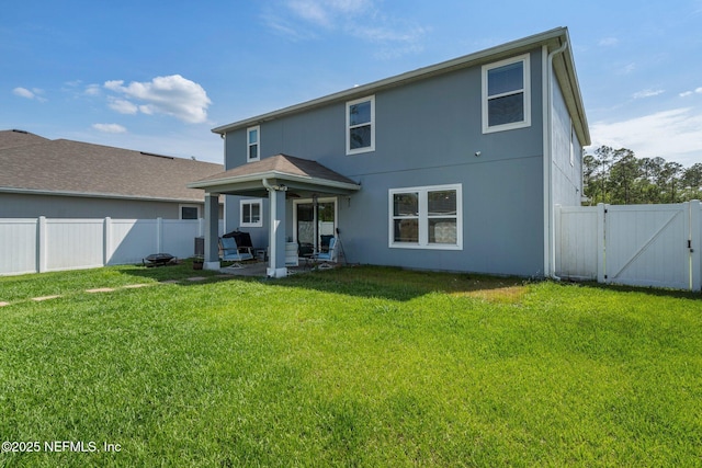 2522 Lantana Ln, Green Cove Springs, FL 32043 - back of house with a gate, a patio area, and stucco siding