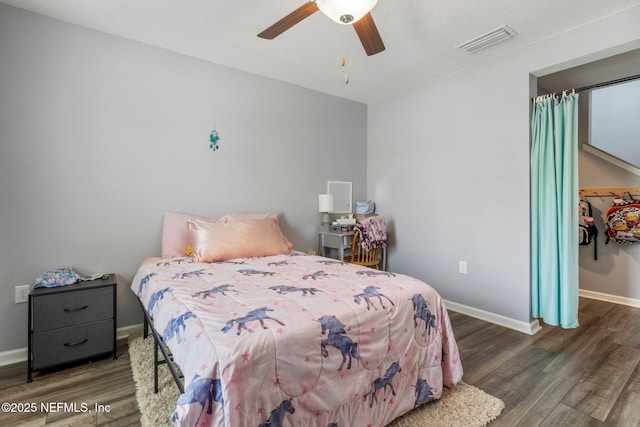 2522 Lantana Ln, Green Cove Springs, FL 32043 - bedroom featuring wood finished floors, baseboards, and ceiling fan