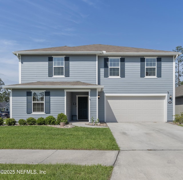 2522 Lantana Ln, Green Cove Springs, FL 32043 - traditional-style house featuring a garage, concrete driveway, and a front yard