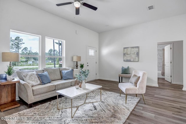 4410 Vicki St, Hastings, FL 32145 - living area with wood finished floors, ceiling fan, and baseboards