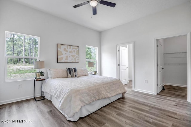 4410 Vicki St, Hastings, FL 32145 - bedroom with wood finished floors and multiple windows