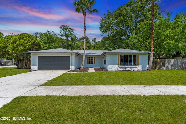 4923 Lofty Pines Cir E, Jacksonville, FL 32210 - ranch-style house featuring an attached garage, driveway, and stone siding