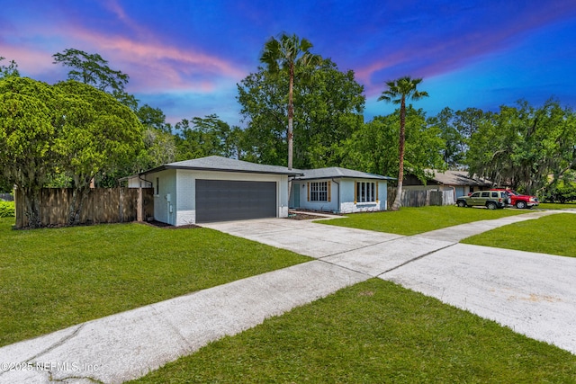 4923 Lofty Pines Cir E, Jacksonville, FL 32210 - single story home featuring driveway, a garage, and brick siding