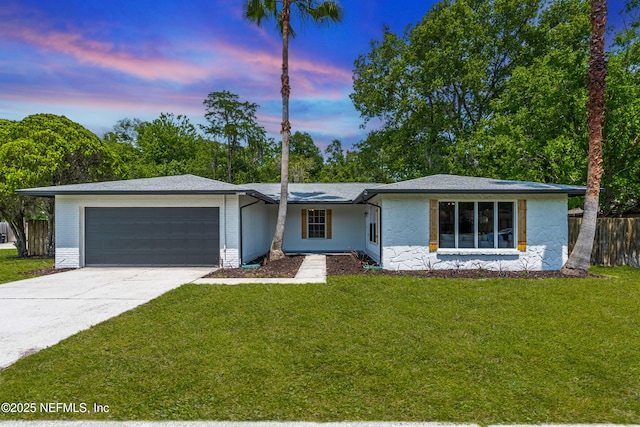 4923 Lofty Pines Cir E, Jacksonville, FL 32210 - view of front of house featuring a garage and driveway
