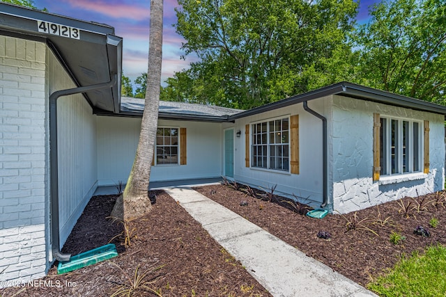 4923 Lofty Pines Cir E, Jacksonville, FL 32210 - view of exterior entry with brick siding