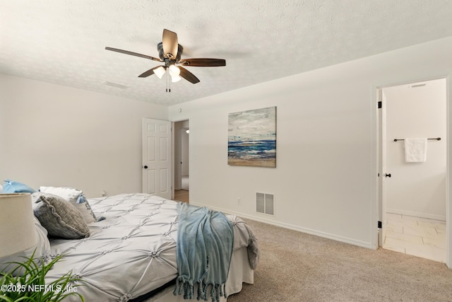 4923 Lofty Pines Cir E, Jacksonville, FL 32210 - bedroom featuring baseboards, a textured ceiling, a ceiling fan, and carpet flooring
