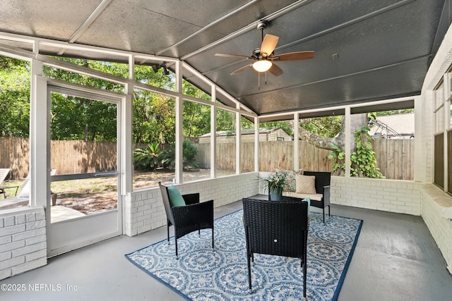 4923 Lofty Pines Cir E, Jacksonville, FL 32210 - sunroom featuring ceiling fan, lofted ceiling, and an outdoor living space