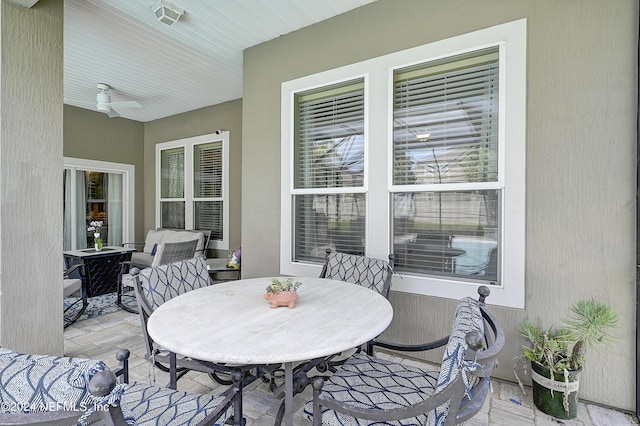 3051 Paddle Creek Dr, Green Cove Springs, FL 32043 - view of patio / terrace featuring a ceiling fan and outdoor dining space