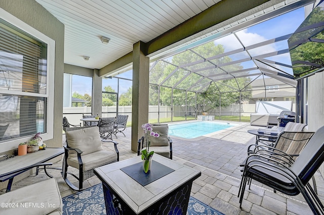 3051 Paddle Creek Dr, Green Cove Springs, FL 32043 - fenced backyard with a patio area, glass enclosure, and outdoor dining area
