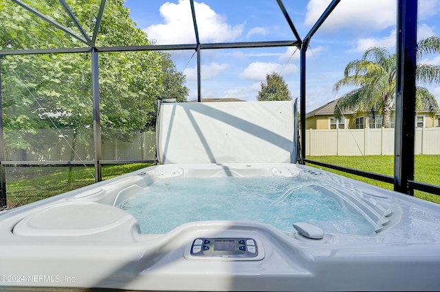 3051 Paddle Creek Dr, Green Cove Springs, FL 32043 - sunroom featuring a hot tub and plenty of natural light