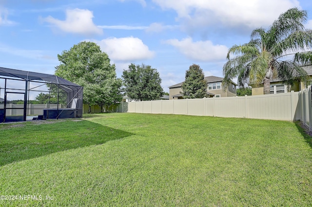 3051 Paddle Creek Dr, Green Cove Springs, FL 32043 - view of yard featuring glass enclosure