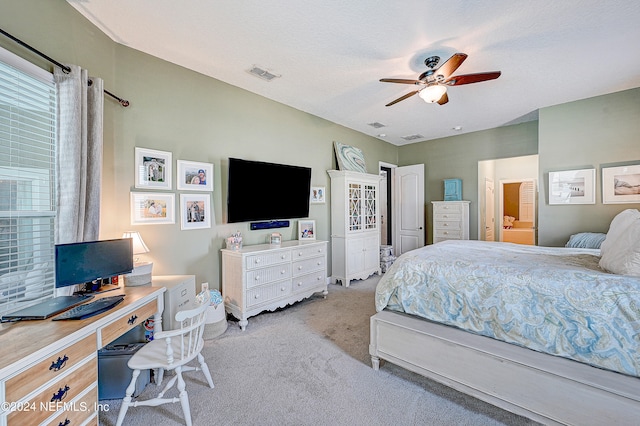 3051 Paddle Creek Dr, Green Cove Springs, FL 32043 - bedroom featuring light carpet, a desk, ensuite bath, and ceiling fan