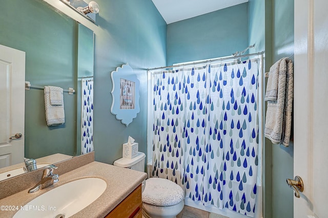 3051 Paddle Creek Dr, Green Cove Springs, FL 32043 - full bath with a shower with shower curtain, toilet, vanity, and tile patterned flooring