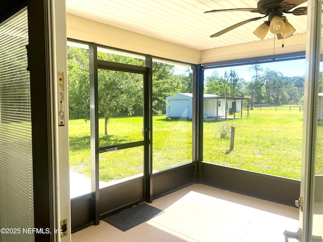 2253 S Mimosa Ave, Middleburg, FL 32068 - unfurnished sunroom featuring a ceiling fan