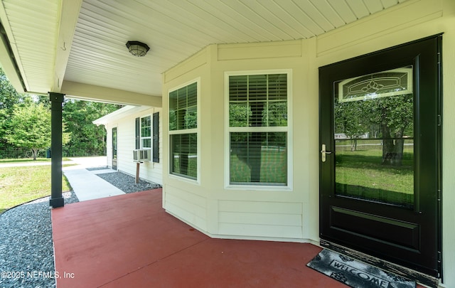 2253 S Mimosa Ave, Middleburg, FL 32068 - view of exterior entry with a porch and cooling unit