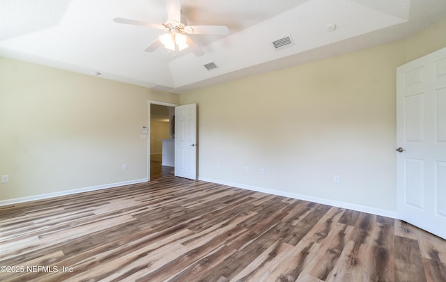 2253 S Mimosa Ave, Middleburg, FL 32068 - unfurnished bedroom with wood finished floors, baseboards, and ceiling fan
