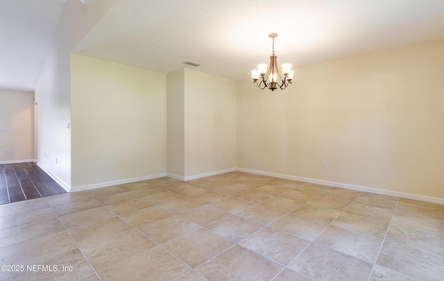 2253 S Mimosa Ave, Middleburg, FL 32068 - spare room featuring a chandelier and baseboards