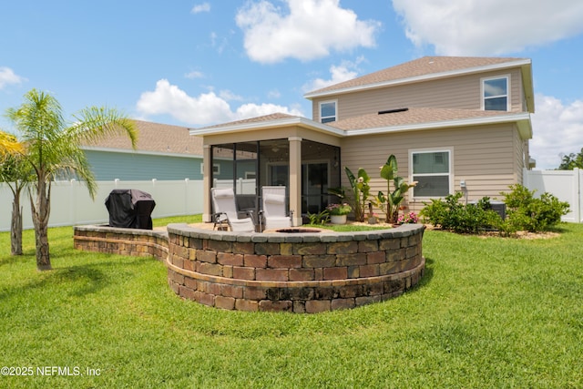 222 River Mist Dr, Saint Augustine, FL 32095 - rear view of house featuring a sunroom, a patio, and roof with shingles