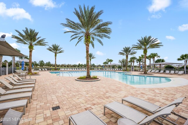 222 River Mist Dr, Saint Augustine, FL 32095 - community pool with a patio area
