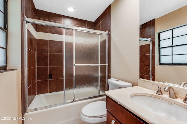 79 Sanchez Dr E, Ponte Vedra Beach, FL 32082 - full bathroom featuring toilet, vanity, and bath / shower combo with glass door