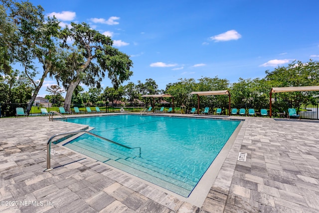 79 Sanchez Dr E, Ponte Vedra Beach, FL 32082 - community pool featuring a patio area